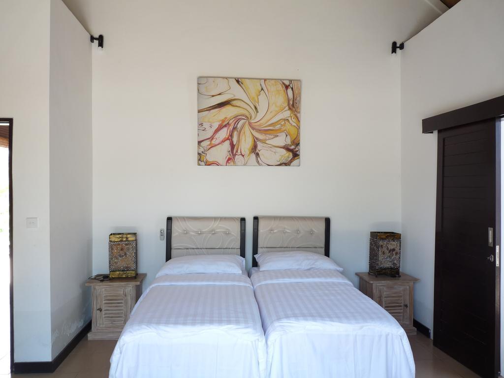 Taman Dewi Sri Villa Et Bungalow Pemuteran Rom bilde